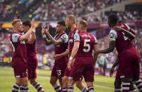 West Ham United's Tomas Soucek celebrates scoring their side's second goal of the game with team-mates during the English Premier League soccer between West Ham United and Luton Town match at the London Stadium, London, Saturday May 11, 2024. (Victoria Jones/PA via AP)