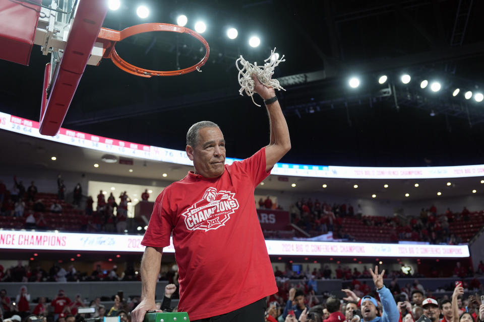 Houston coach Kelvin Sampson cuts down the net after an NCAA college basketball game against Kansas Saturday, March 9, 2024, in Houston. Houston won 76-46 and finished the regular season as the Big 12 Conference Champions. (AP Photo/David J. Phillip)