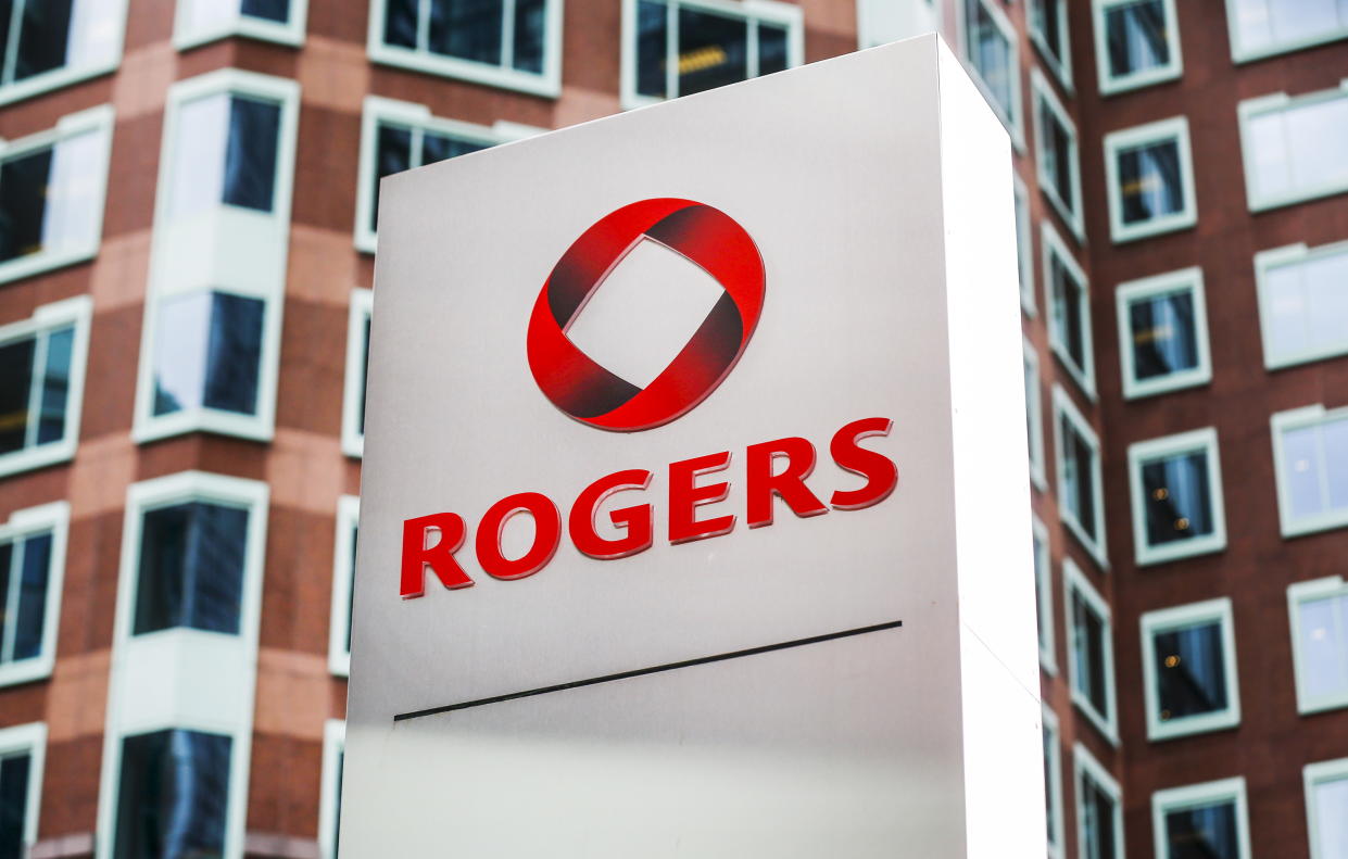 A sign stands in front of Rogers Communications Inc. building. REUTERS/Mark Blinch