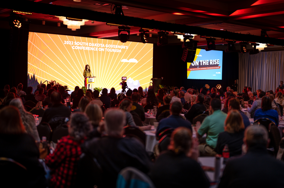 Gov. Kristi Noem presents at the 2022 South Dakota Governor's Conference on Tourism.