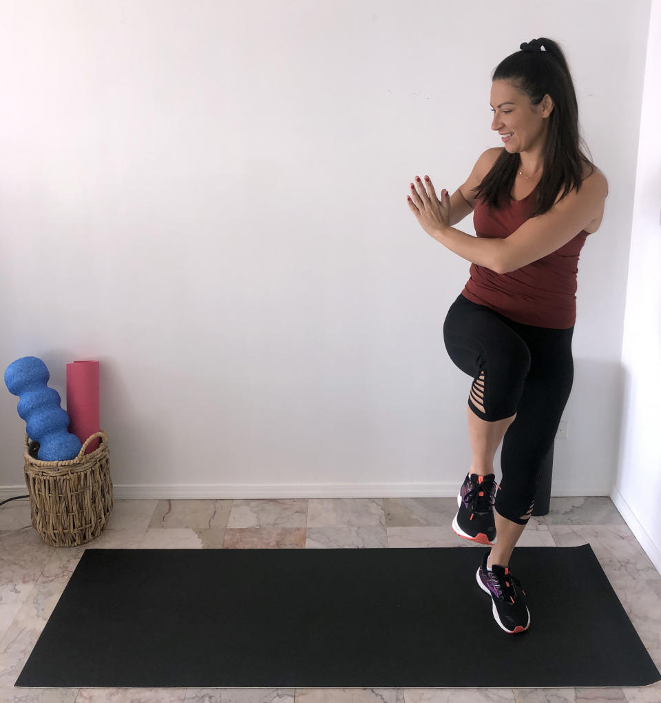 Side lunge with a twist (Stephanie Mansour)