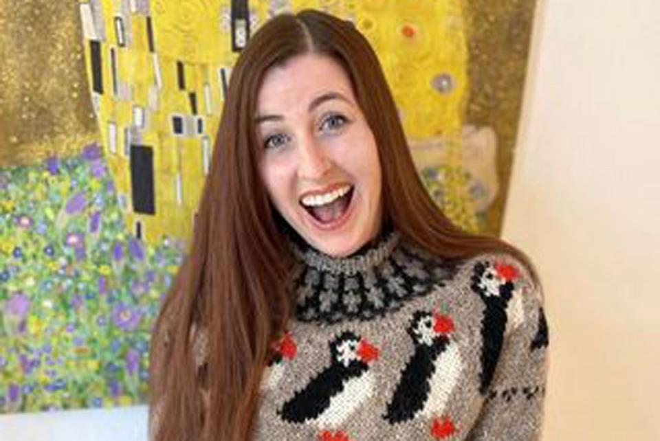 <p>Nathan Robbins</p> Celia Robbins wearing puffins sweater.