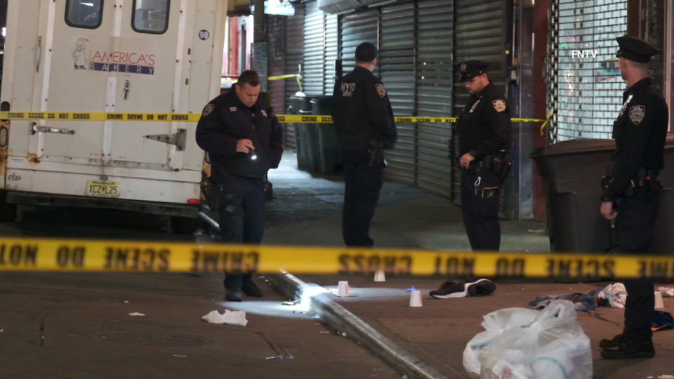 <div>Scene where police shot a man wielding a knife in an argument with a woman in Queens.</div>