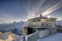 <p>Another one for the Bond fans (well, jet-setting is part of his job description, after all...) You can follow in the footsteps of George Lazenby's short-lived 007 incarnations up into the snowy <a href="https://www.goodhousekeepingholidays.com/tours/switzerland-bernese-oberland-railway" rel="nofollow noopener" target="_blank" data-ylk="slk:Swiss Alps;elm:context_link;itc:0;sec:content-canvas" class="link ">Swiss Alps</a> to the Schilthorn summit. This pristine mountain peak is home to the Piz Gloria revolving restaurant, used as a set for the fictional mountain-top hideout of Bond villain Ernst Stavro Blofeld in On Her Majesty's Secret Service. </p><p>In the film, James Bond ultimately destroys the secret lair, but in reality, the Bond production team actually helped to finance the completion of the unique revolving restaurant found there today. The restaurant offers outstanding panoramic views over the Bernese Oberland and can be reached by a 32-minute aerial cableway with sweeping alpine vistas all the way up.</p><p>As impressive as this rotating restaurant is, there's more to explore in the Bernese Oberland. While there, you can traverse the mountains by railways, funiculars, and cableways to explore the phenomenal landscape of snowy peaks and extraordinary turquoise lakes.<strong><br></strong></p><p><strong>How to visit: </strong>Try a trip to the <a href="https://www.goodhousekeepingholidays.com/tours/switzerland-bernese-oberland-railway" rel="nofollow noopener" target="_blank" data-ylk="slk:Swiss Alps in October 2023;elm:context_link;itc:0;sec:content-canvas" class="link ">Swiss Alps in October 2023</a>, which includes a visit to Piz Gloria, complete with a James Bond-themed brunch. When you're not retracing the footsteps of George Lazenby, you'll be exploring the stunning Alps by rail, including a trip to the highest railway station in Europe and a nostalgic ride on a steam train.</p><p><a class="link " href="https://www.goodhousekeepingholidays.com/tours/switzerland-bernese-oberland-railway" rel="nofollow noopener" target="_blank" data-ylk="slk:FIND OUT MORE;elm:context_link;itc:0;sec:content-canvas">FIND OUT MORE</a> </p><p>Alternatively, join a <a href="https://www.goodhousekeepingholidays.com/tours/switzerland-swiss-alps-glacier-express-tour" rel="nofollow noopener" target="_blank" data-ylk="slk:four-night stay;elm:context_link;itc:0;sec:content-canvas" class="link ">four-night stay</a> in lovely Interlaken, which includes visits to Lucerne and Bern, a cruise across Lake Thun, and a day on the delightful Glacier Express, enjoying a leisurely three-course lunch while you climb slowly and steadily higher up into the snow-blanketed Alps.</p><p><a class="link " href="https://www.goodhousekeepingholidays.com/tours/switzerland-swiss-alps-glacier-express-tour" rel="nofollow noopener" target="_blank" data-ylk="slk:FIND OUT MORE;elm:context_link;itc:0;sec:content-canvas">FIND OUT MORE</a> </p>