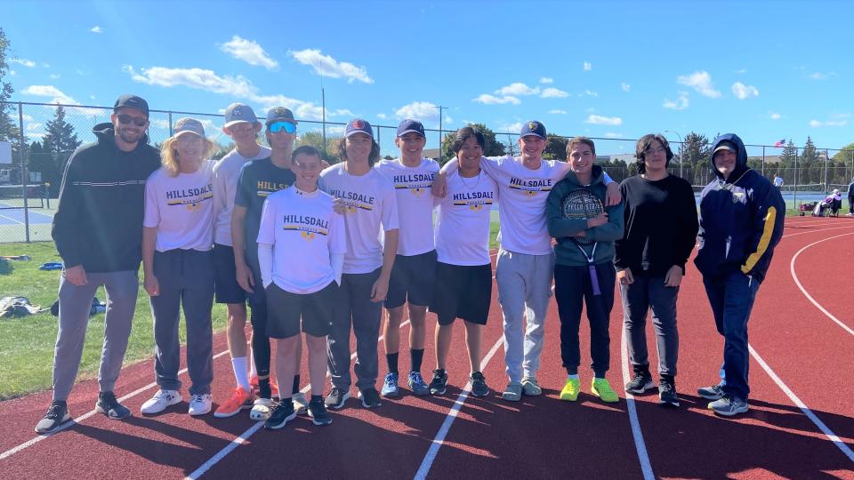 Hillsdale boys tennis, with coaches Jonathan Degtyaryov and Matthe Duff (left and right) finish their 2024 season at the Gross Ile regional tournament.