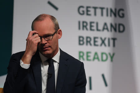 Ireland's Minister for Foreign Affairs and Trade, Simon Coveney, speaks at a 'Getting Ireland Brexit Ready' workshop at the Convention Centre in Dublin, Ireland October 25, 2018. REUTERS/Clodagh Kilcoyne