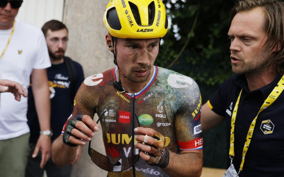 Crashes, chaos and carnage on the cobbles as the Tour de France is shaken to pieces – live updates - EPA