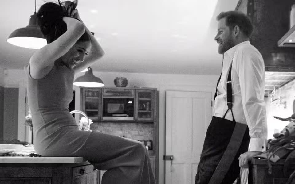 Prince Harry and Meghan, Duke and Duchess of Sussex in the kitchen taken from their Harry & Meghan documentary