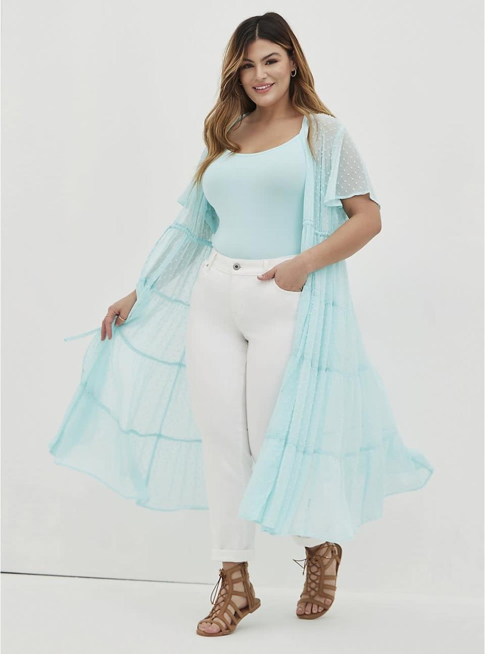 <h2>Torrid Tiered Chiffon Clip Robe</h2><br>Spring's answer to <a href="https://www.refinery29.com/en-us/oversized-cardigan-coat-coatigan" rel="nofollow noopener" target="_blank" data-ylk="slk:the coatigan" class="link ">the coatigan</a>, this floaty, flirty, cardigan-esque top is light enough to keep you from overheating while layering — and leveling — up your look.<br><br><em>Shop <a href="https://www.torrid.com/" rel="nofollow noopener" target="_blank" data-ylk="slk:Torrid" class="link "><strong>Torrid</strong></a></em><br><br><strong>Torrid</strong> Tiered Chiffon Clip Robe, $, available at <a href="https://go.skimresources.com/?id=30283X879131&url=https%3A%2F%2Fwww.torrid.com%2Fproduct%2Ftiered-kimono---chiffon-clip-dot-blue%2F16844532.html%3F_br_psugg_q%3Dkimono" rel="nofollow noopener" target="_blank" data-ylk="slk:Torrid" class="link ">Torrid</a>