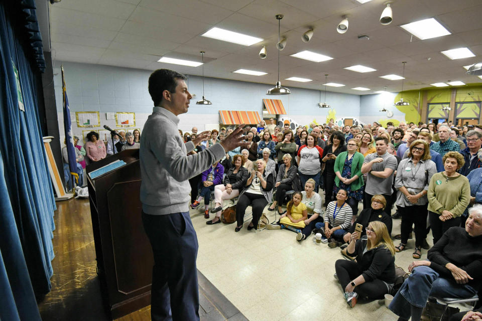 In this March 23, 2019, photo, South Bend Mayor Pete Buttigieg speaks to a crowd about his presidential run during the Democratic monthly breakfast at the Circle of Friends Community Center in Greenville, S.C. Buttigieg was the longest of long shots when he announced a presidential exploratory committee in January. But now the underdog bid is gaining momentum, and Buttigieg can feel it. (AP Photo/Richard Shiro)