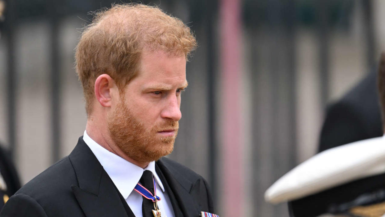 LONDON, ENGLAND - SEPTEMBER 19: Prince Harry, Duke of Sussex during the State Funeral of Queen Elizabeth II at Westminster Abbey on September 19, 2022 in London, England. Elizabeth Alexandra Mary Windsor was born in Bruton Street, Mayfair, London on 21 April 1926. She married Prince Philip in 1947 and ascended the throne of the United Kingdom and Commonwealth on 6 February 1952 after the death of her Father, King George VI. Queen Elizabeth II died at Balmoral Castle in Scotland on September 8, 2022, and is succeeded by her eldest son, King Charles III. (Photo by Karwai Tang/WireImage)