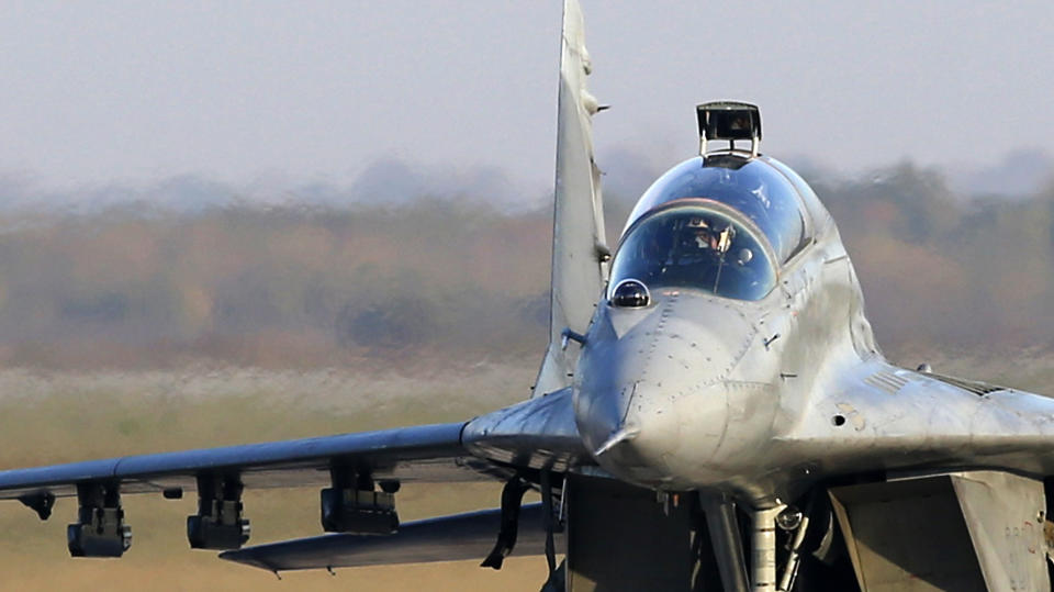 In this photo taken Tuesday, Oct. 17, 2017 Serbian Army MiG-29 jet fighter prepares for flight at the military airport Batajnica near Belgrade, Serbia. Serbia's Defense Minister Aleksandar Vulin said Monday June 24, 2019 that live-ammunition drills being held with Russian and Belarusian troops show that Serbia has allies in any future war in the Balkans. (AP Photo/Darko Vojinovic)