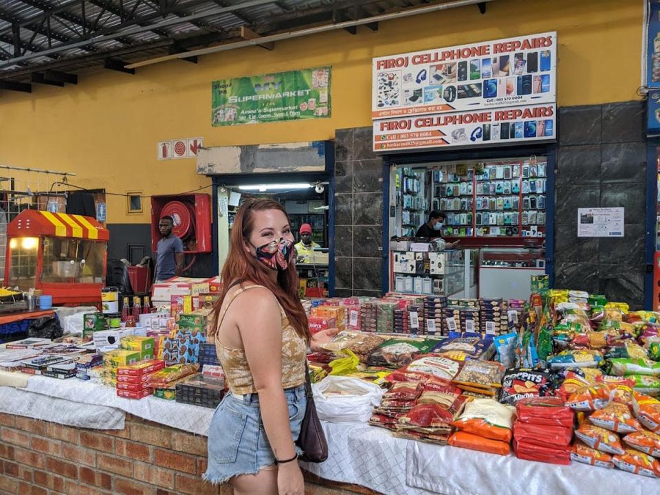 Megan Gieske in open-air market