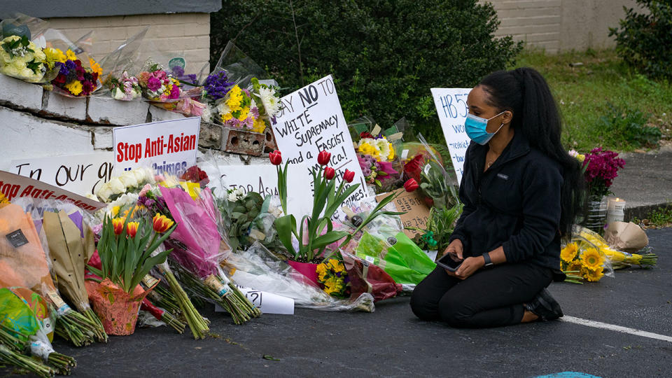 Flowers, pictured here at the memorial sight outside The Gold Spa in Atlanta, Georgia.