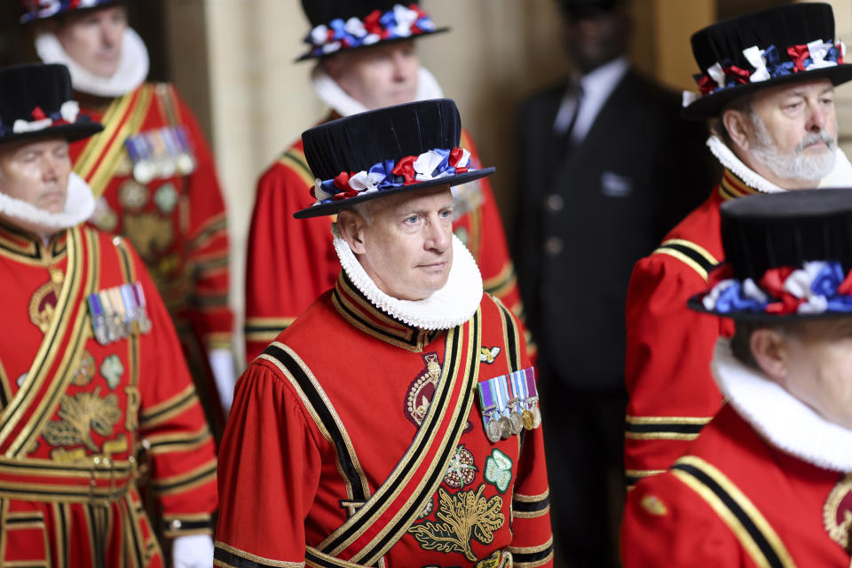 Yeomen of the Guard parade through the Sovereign's entrance ahead of the State Opening of Parliament at Houses of Parliament, in London, Tuesday, May 10, 2022 Britain’s Parliament opens a new year-long session on Tuesday with a mix of royal pomp and raw politics, as Prime Minister Boris Johnson tries to re-energize his scandal-tarnished administration and address the U.K.’s worsening cost-of-living crisis. Johnson’s Conservative government will set out the laws it plans to pass in the coming year at the tradition-steeped State Opening of Parliament. The ceremony will take place without 96-year-old Queen Elizabeth II, who has pulled out of the ceremony because of what Buckingham Palace calls “mobility issues.”. (Chris Jackson/Pool Photo via AP)