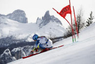 United States' Mikaela Shiffrin speeds down the course during a women's giant slalom, at the alpine ski World Championships in Cortina d'Ampezzo, Italy, Thursday, Feb. 18, 2021. (AP Photo/Gabriele Facciotti)