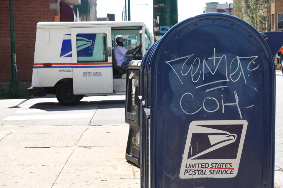 CHICAGO, ILLINOIS - AUGUST 13: Mail boxes sit in front of a United State Postal Service facility on August 13, 2020 in Chicago, Illinois.  President Donald Trump said today that he opposes additional funding for the Postal Service because the lack of additional funding would make it more difficult to deliver mail-in ballots. (Photo by Scott Olson/Getty Images)