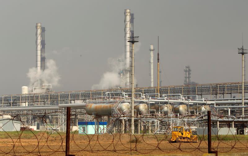 FILE PHOTO: An oil refinery located on a branch of the Druzhba oil pipeline, which moves crude through the pipeline westwards to Europe, is seen near Mozyr