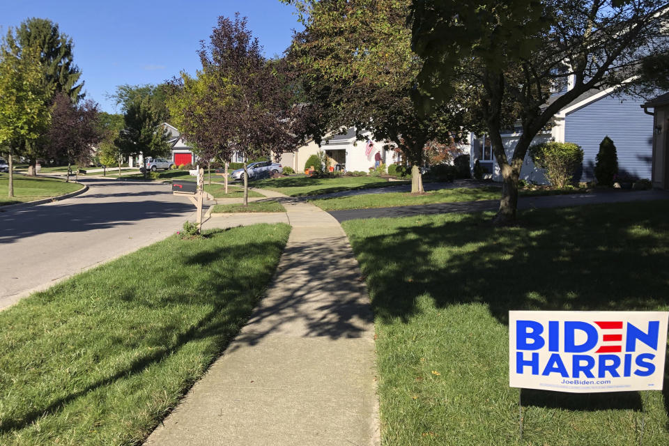 A Biden for President sign in a lawn of suburban Dublin, Ohio, on Friday, Sept. 18, 2020. In the campaign for House control, some districts are seeing a fight between Democrats saying they'll protect voters from Republicans willing to take their health coverage away, while GOP candidates are raising specters of rioters imperiling neighborhoods if Democrats win. (AP Photo/Julie Carr Smyth)