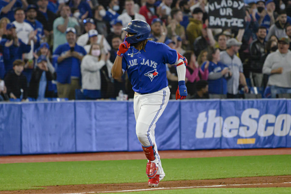 Toronto Blue Jays' Vladimir Guerrero Jr. runs bases after hitting a home run against the Houston Astros during the third inning of a baseball game Friday, April 29, 2022, in Toronto. (Christopher Katsarov/The Canadian Press via AP)