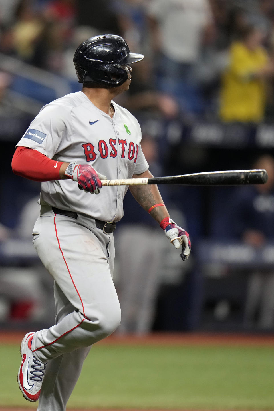 Boston Red Sox's Rafael Devers watches his two-run home run off Tampa Bay Rays starting pitcher Taj Bradley during the fourth inning of a baseball game Monday, May 20, 2024, in St. Petersburg, Fla. (AP Photo/Chris O'Meara)