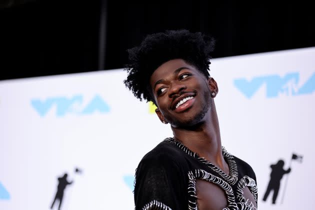 Lil Nas X poses in the press room at the 2022 MTV VMAs in August. (Photo: Jamie McCarthy/Getty Images for MTV/Paramount Global)