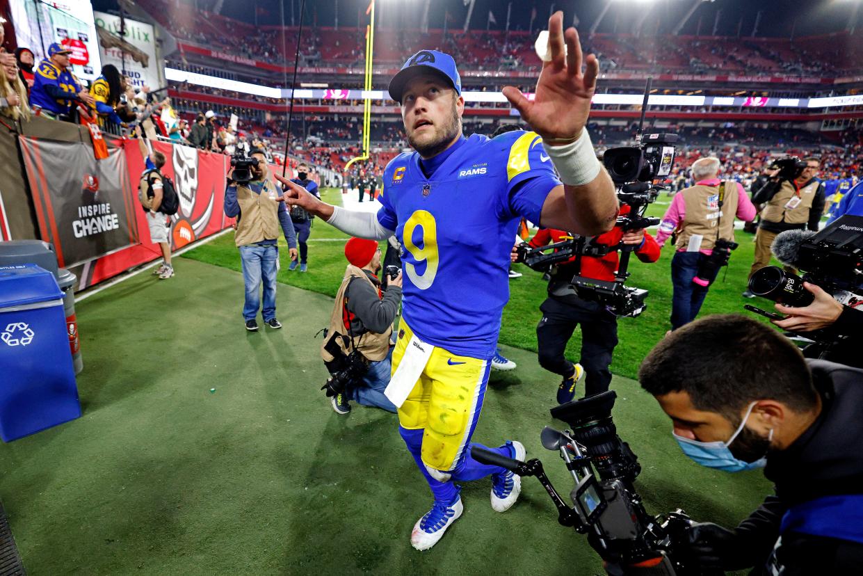 Jan 23, 2022; Tampa, Florida, USA; Los Angeles Rams quarterback Matthew Stafford (9) walks off the field after beating the Tampa Bay Buccaneers in NFC Divisional playoff football game at Raymond James Stadium. Nathan Ray Seebeck-USA TODAY Sports