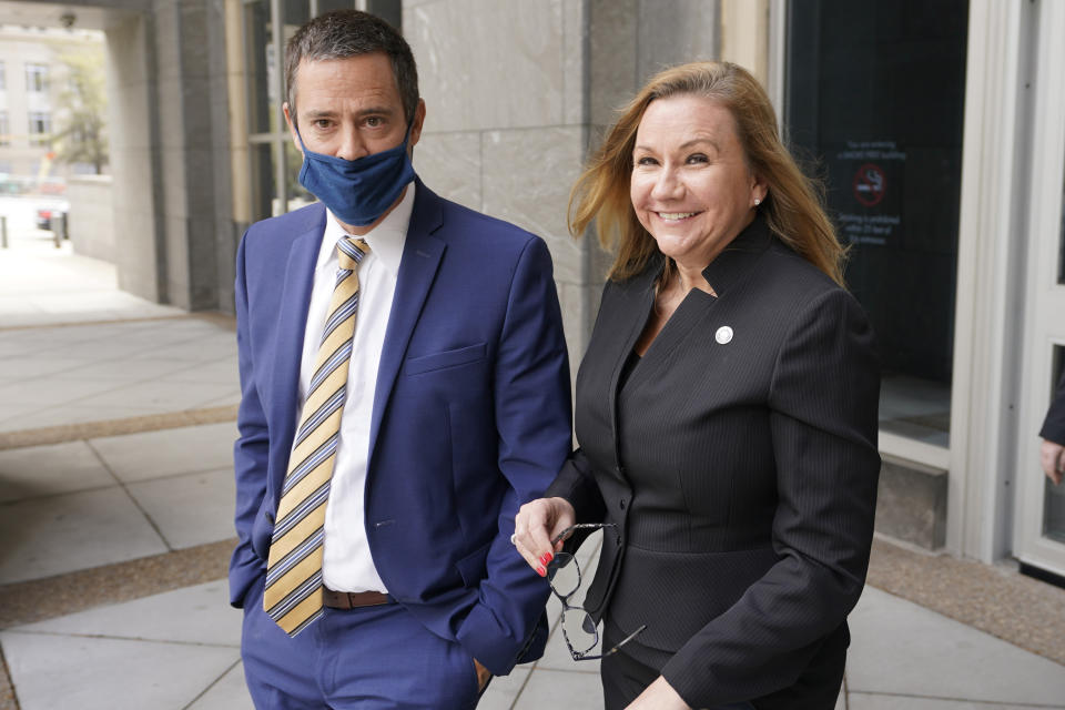 Virginia State Sen. Amanda Chase, R-Chesterfield, right, leaves court with her attorney Tim Anderson during a break in a hearing to dismiss here lawsuit in Federal court in Richmond, Va., Thursday, April 1, 2021. . (AP Photo/Steve Helber)