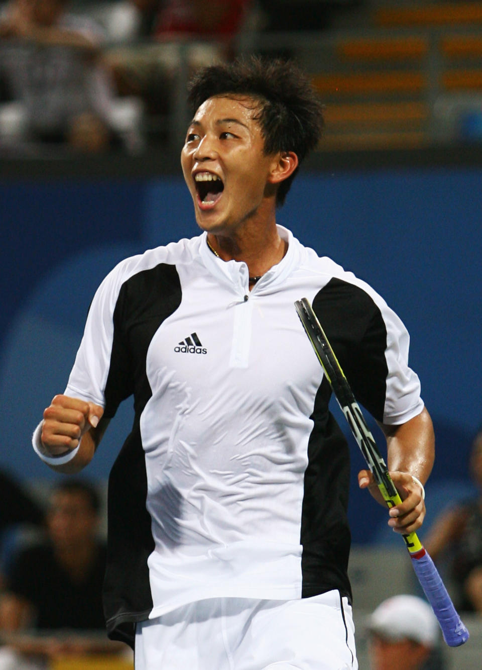 BEIJING - AUGUST 11:  Lu Yen-Hsun of Chinese Taipei celebrates winning match point against Andy Murray of Great Britain in the Men's Singles First Round match at the Olympic Green Tennis Center on Day 3 of the Beijing 2008 Olympic Games on August 11, 2008 in Beijing, China.  (Photo by Julian Finney/Getty Images)