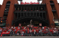 ST. LOUIS, MO - OCTOBER 30: St. Louis Cardinals fans celebrate outside Busch Stadium during a parade celebrating the team's 11th World Series championship October 30, 2011 in St. Louis, Missouri. (Photo by Whitney Curtis/Getty Images)