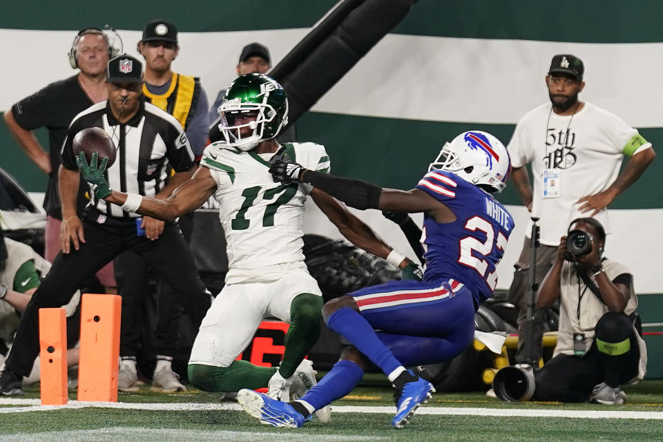 New York Jets wide receiver Garrett Wilson (17) makes a touchdown catch against Buffalo Bills cornerback Tre'Davious White (27) during the fourth quarter of an NFL football game, Monday, Sept. 11, 2023, in East Rutherford, N.J. (AP Photo/Seth Wenig)