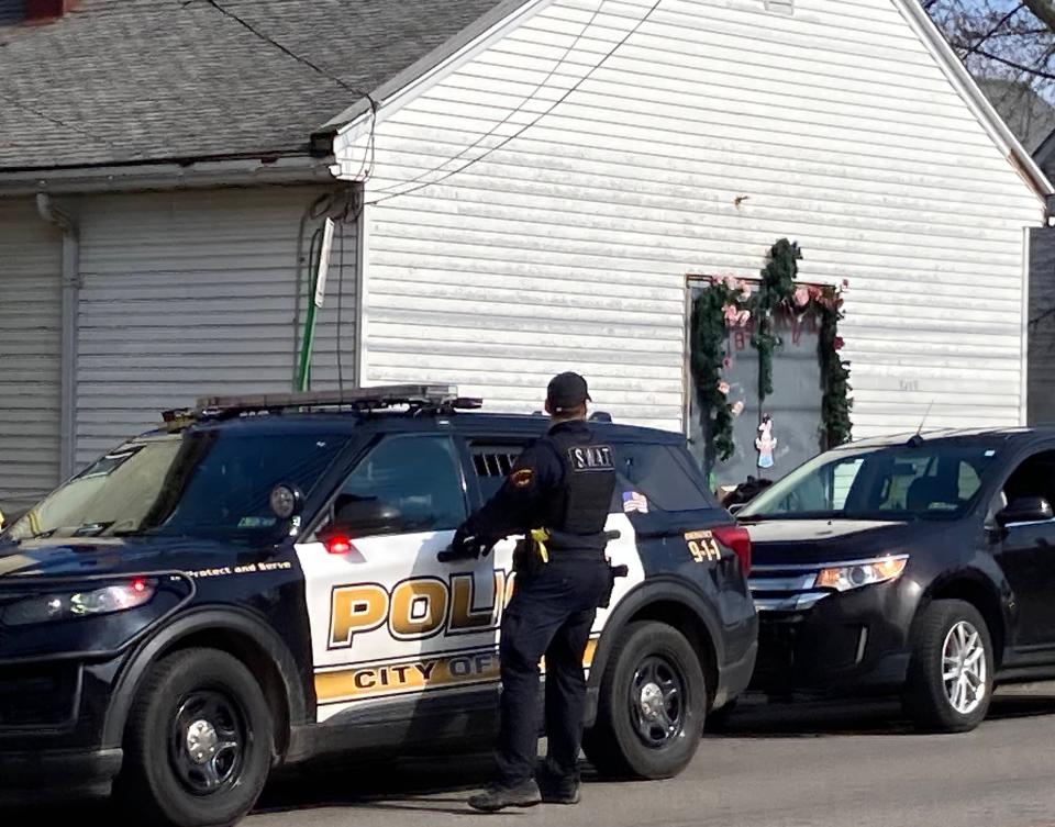 Erie police talked to people on Cherry street at West 16th street after a shooting was reported in the area shortly before 3:50 p.m. on Monday. The report of a shooting in the 1600 block of Cherry Street coincided with a shooting at Columbus Park, about a block west.