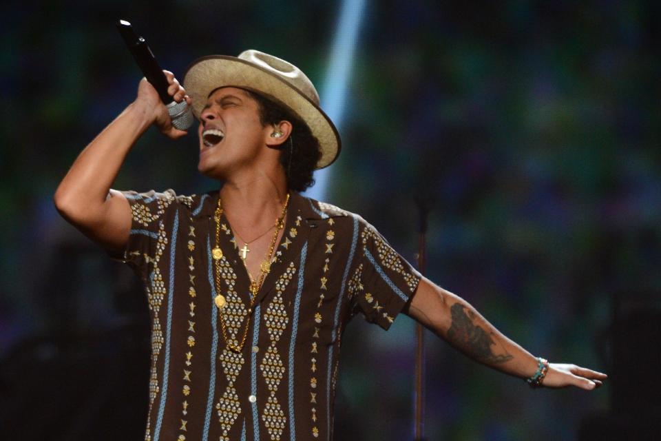 FILE - In this Sept. 21, 2013 file photo, Bruno Mars performs at IHeartRadio Music Festival in Las Vegas. Mars’ “Gorilla” is an example of his musical prowess: It’s vocally impressive, sultry and smoky, and beat-tastic. (Photo by Al Powers/Powers Imagery/Invision /AP, File)