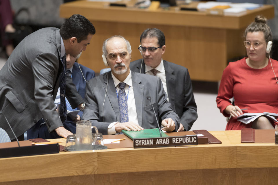 Bashar Ja'afari, center, Syrian Ambassador to the United Nations, attends a Security Council meeting, Wednesday, Oct. 17, 2018 at U.N. headquarters. (Rick Bajornas/UN via AP)