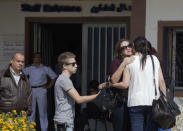 Relatives of passengers on a vanished EgyptAir flight leave the EgyptAir in-flight service building where they were held at Cairo International Airport, Egypt, Thursday, May 19, 2016. (AP/Amr Nabil)