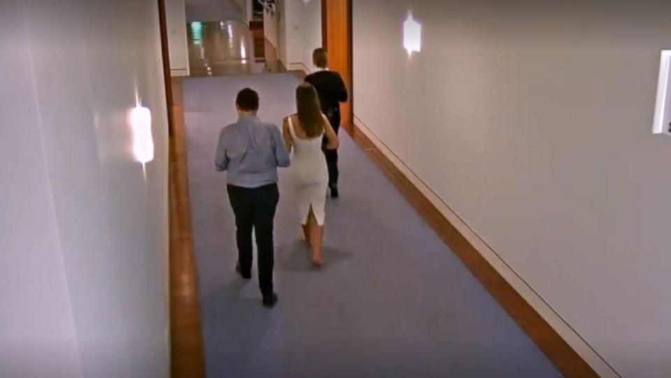 CCTV vision showed the two entering Parliament House at 1:47am and being escorted to the lift. Picture: 7 News