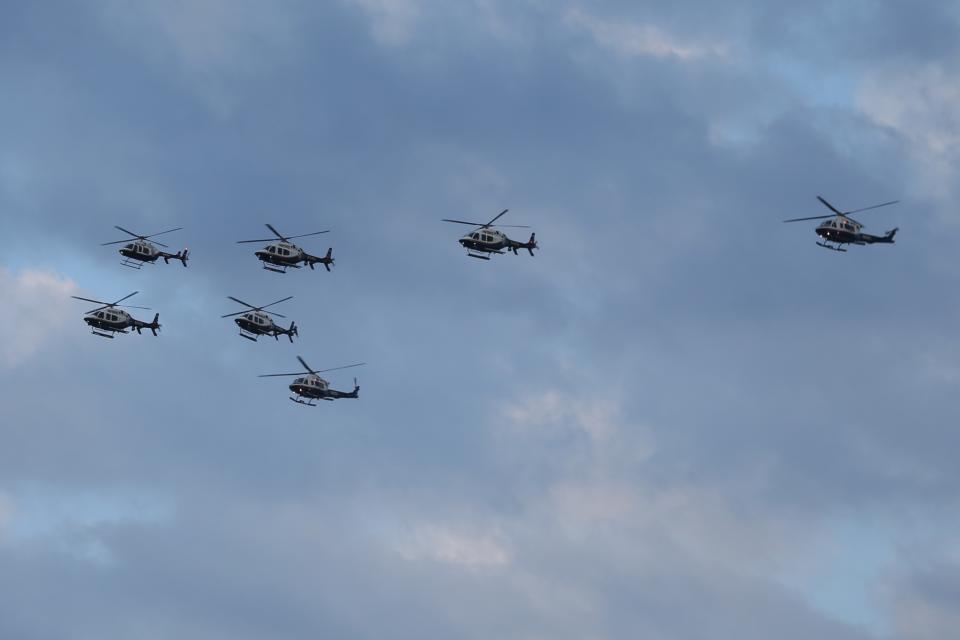 <p>Police helicopters fly in formation over the East River prior to the Fourth of July fireworks celebration, July 4, 2017, in New York City. (Gordon Donovan/Yahoo News) </p>