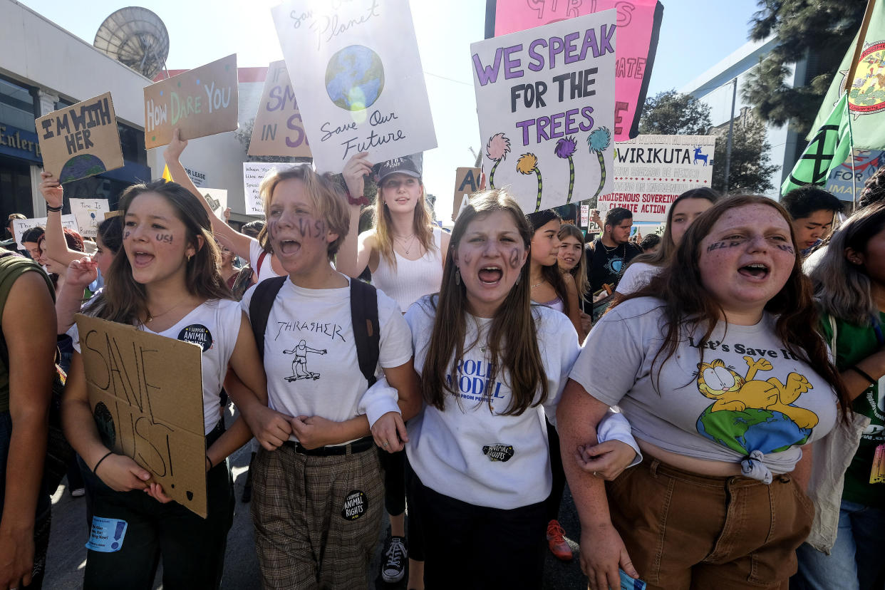 Climate activists participate in a student-led climate change march in Los Angeles on Nov. 1. (Photo: ASSOCIATED PRESS)