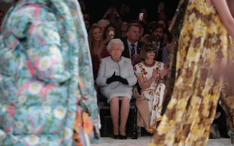 The Queen views Richard Quinn's runway show - Credit: PA