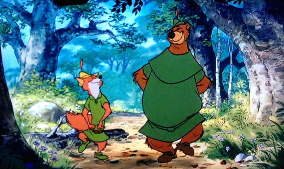 Robin and Little John walking through the forest