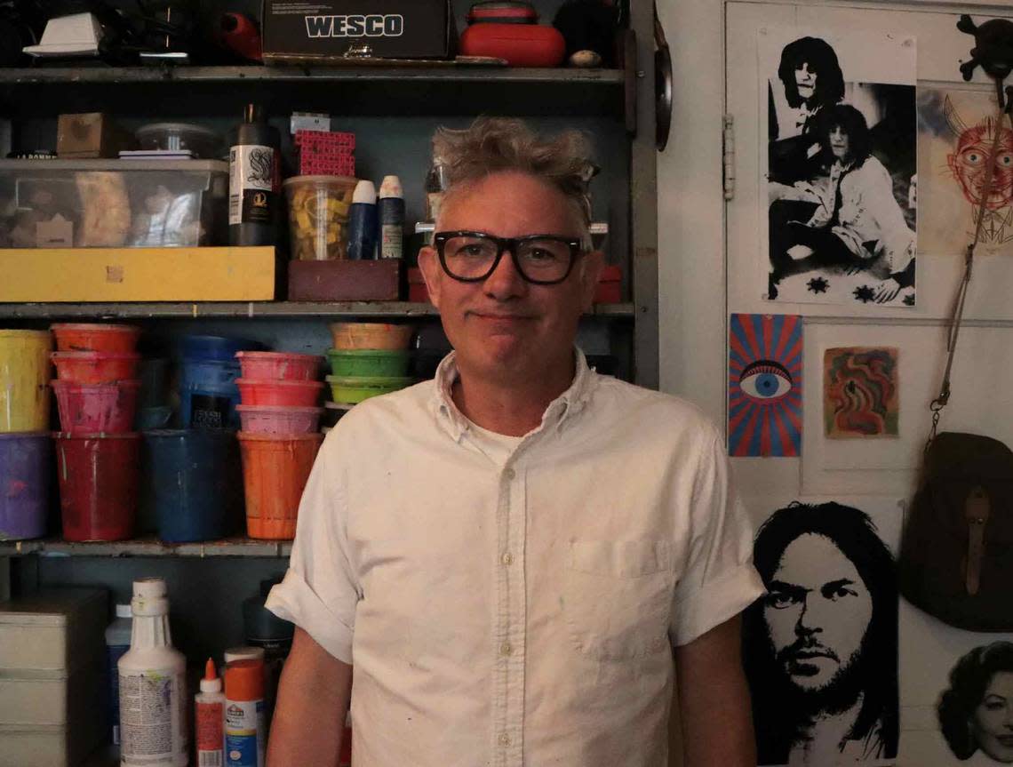 Ron Liberti poses for a portrait in his in-home studio in Wilson. Liberti has been creating posters for North Carolina music venues for more than three decades. His specialty is screenprinting.