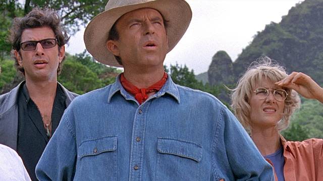 Jeff Goldblum, Sam Neill and Laura Dern in Jurassic Park (Credit: Universal)