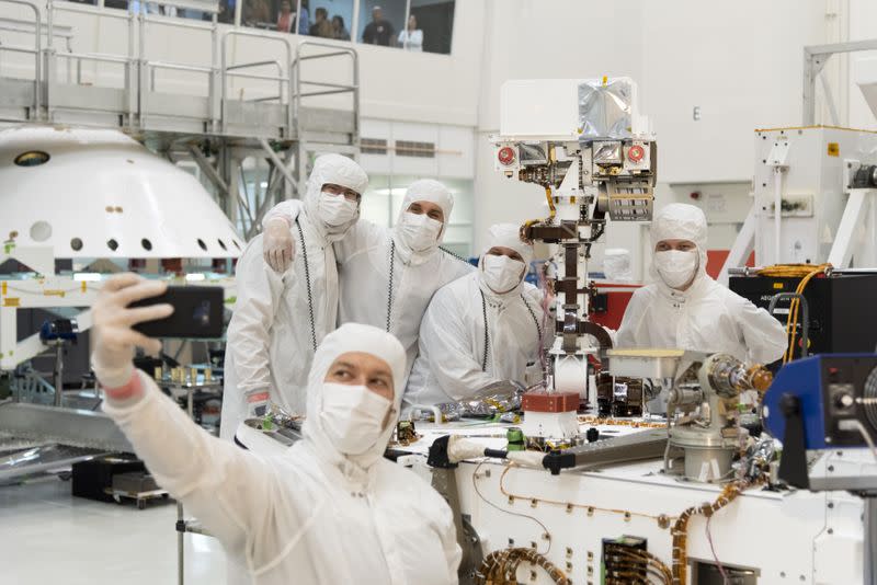 Handout photo of members of NASA's Mars 2020 project assembling the Mars 2020 rover in Pasadena