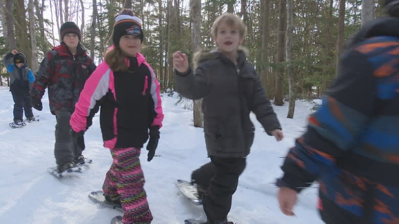 Snowshoes break the trail to ecology lesson for kids