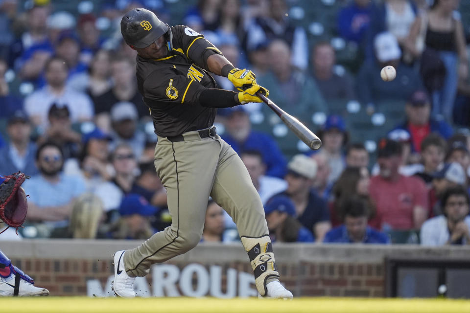 San Diego Padres' Donovan Solano hits a single against the Chicago Cubs during the second inning of a baseball game Tuesday, May 7, 2024, in Chicago. (AP Photo/Erin Hooley)