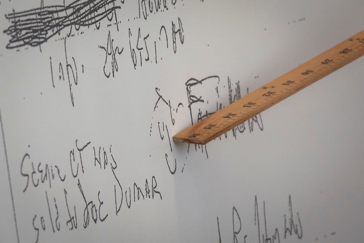 A smiley face written with Aretha Franklin's signature in 2014 is seen during the first day of a jury trial over Franklin's wills at Oakland County Probate Court in Pontiac, Mich (Sarahbeth Maney/Detroit Free Press via AP)