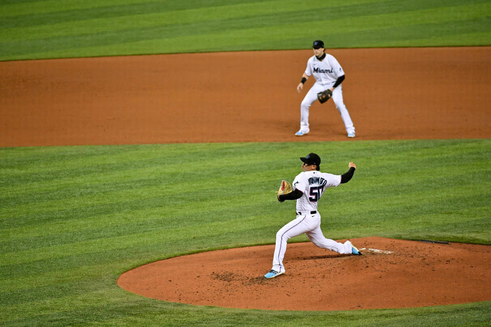 Aug 17, 2020; Miami, Florida, USA; Miami Marlins starting pitcher Jordan Yamamoto (50) delivers a pitch in the second inning against the New York Mets at Marlins Park. Mandatory Credit: Jasen Vinlove-USA TODAY Sports