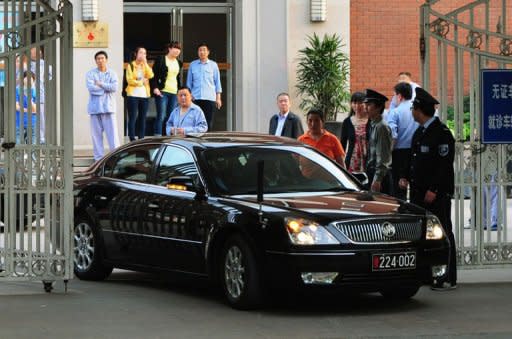 A US Embassy vehicle leaves after visiting blind rights activist Chen Guangcheng at the Chaoyang Hospital in Beijing. Chen appealed to US President Barack Obama to help get him and his family out of China, saying he feared for his life just hours after leaving the US embassy in Beijing