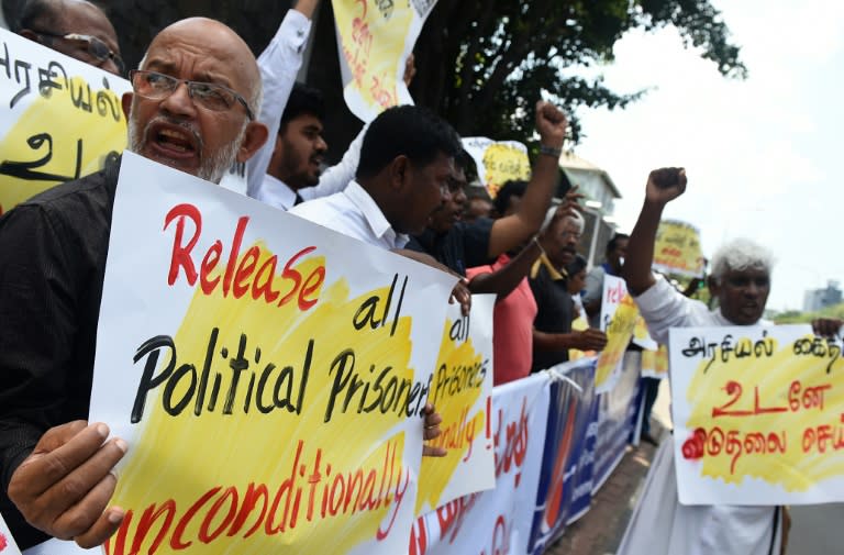 Sri Lankan activists demanding the release of Tamil detainees held in custody for long periods without trial during a demonstrate outside the main prison in Colombo on October 16, 2015