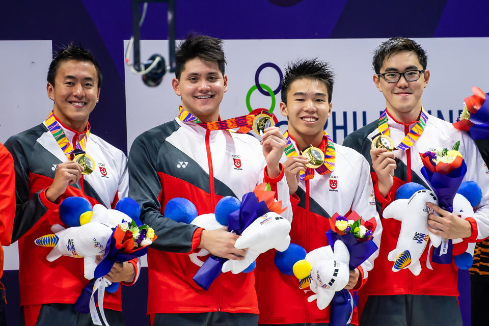 Singapore's gold-winning men's 4x200m freestyle team: (from left) Quah Zheng Wen, Joseph Schooling, Jonathan Tan and Darren Chua. (PHOTO: SNOC/Andy Chua)